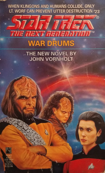 TNG #23. While Worf tries to make peace between a Federation colony and a band of feral Klingons whose presence on the planet predates the colony, Ro Laren keeps an eye on worrisome seismograph readings while enduring prejudice and assassination attempts. Reviewed October 4, 2019. Average. War Drums (TNG #23)