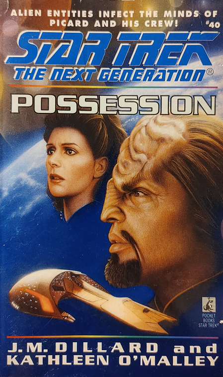TNG #40. An ancient evil that ravaged the planet Vulcan almost a century ago has been biding its time, mutating and adapting inside the mind of a Vulcan scientist, and is now ready to infect the rest of the universe, starting with the Enterprise. Reviewed July 9, 2021. Bad. Possession (TNG #40)