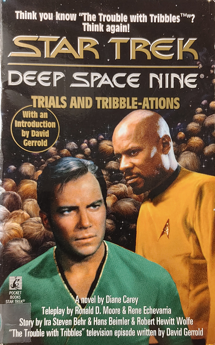DS9 episode novelization. Agents from the Department of Temporal Investigations interrogate Captain Sisko regarding his actions in traveling back in time to prevent Captain Kirk’s assassination at Space Station K-7. Reviewed February 15, 2022. Good. Trials and Tribble-ations (DS9 episode)