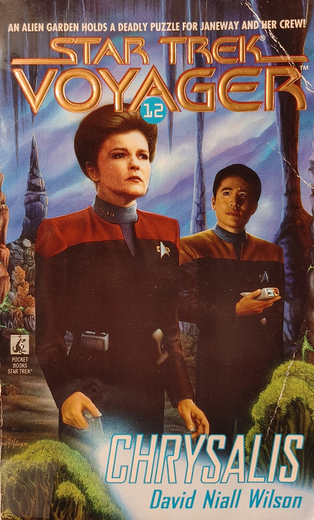 VOY #12. In need of food yet again, Voyager stops at a planet that appears uninhabited, but is home to a species whose members hope to enter a state of joyous ecstasy called the Long Sleep and become excited when it happens to one of Janeway’s ensigns. Reviewed June 4, 2022. Good. Chrysalis (VOY #12)